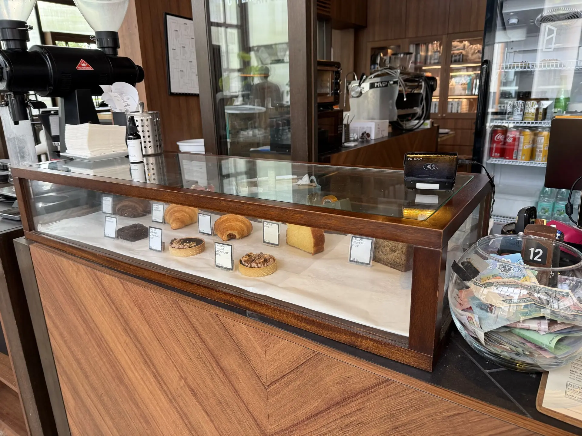 Custom cake display counter for café and hospitality interiors in Kuala Lumpur.